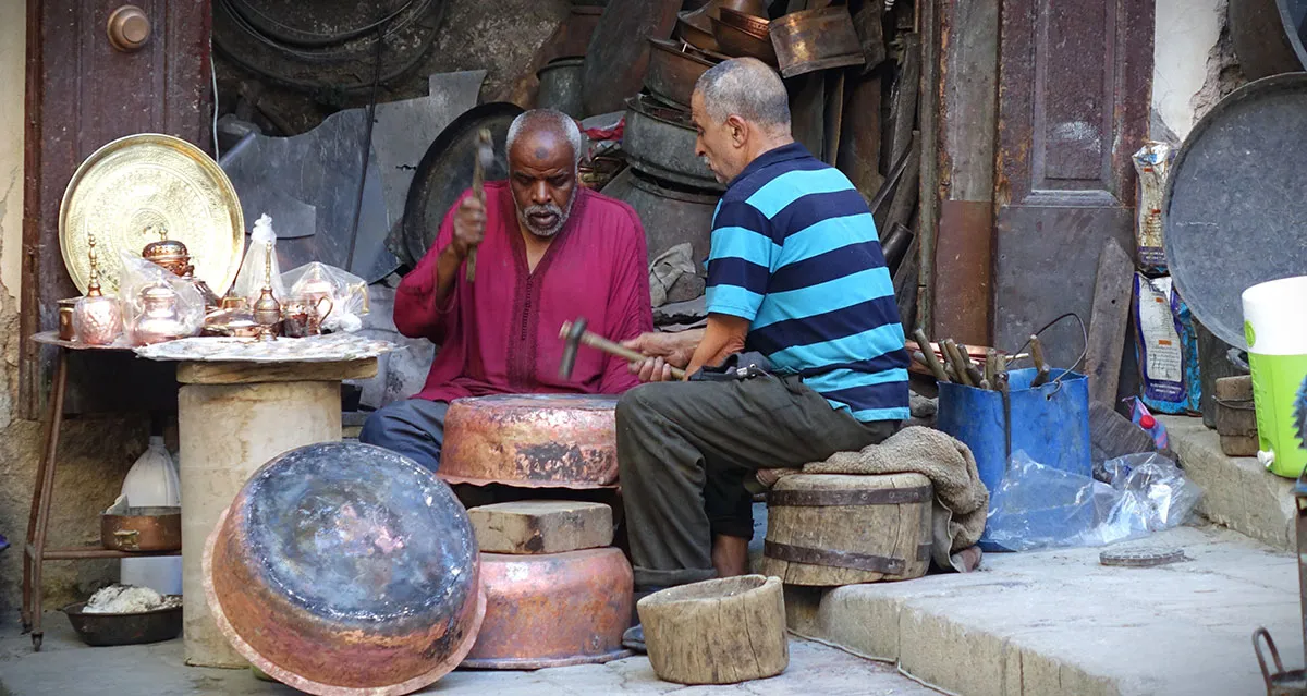 Copper craftsmen at work in Fez